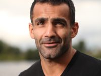 Handsome dark-skinned man expresses some mixed emotions